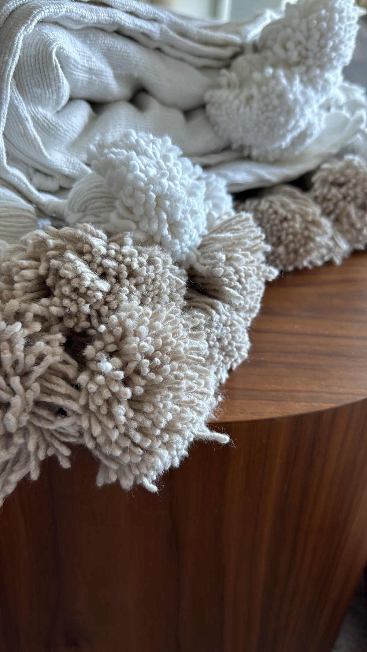 Plaid à pompons