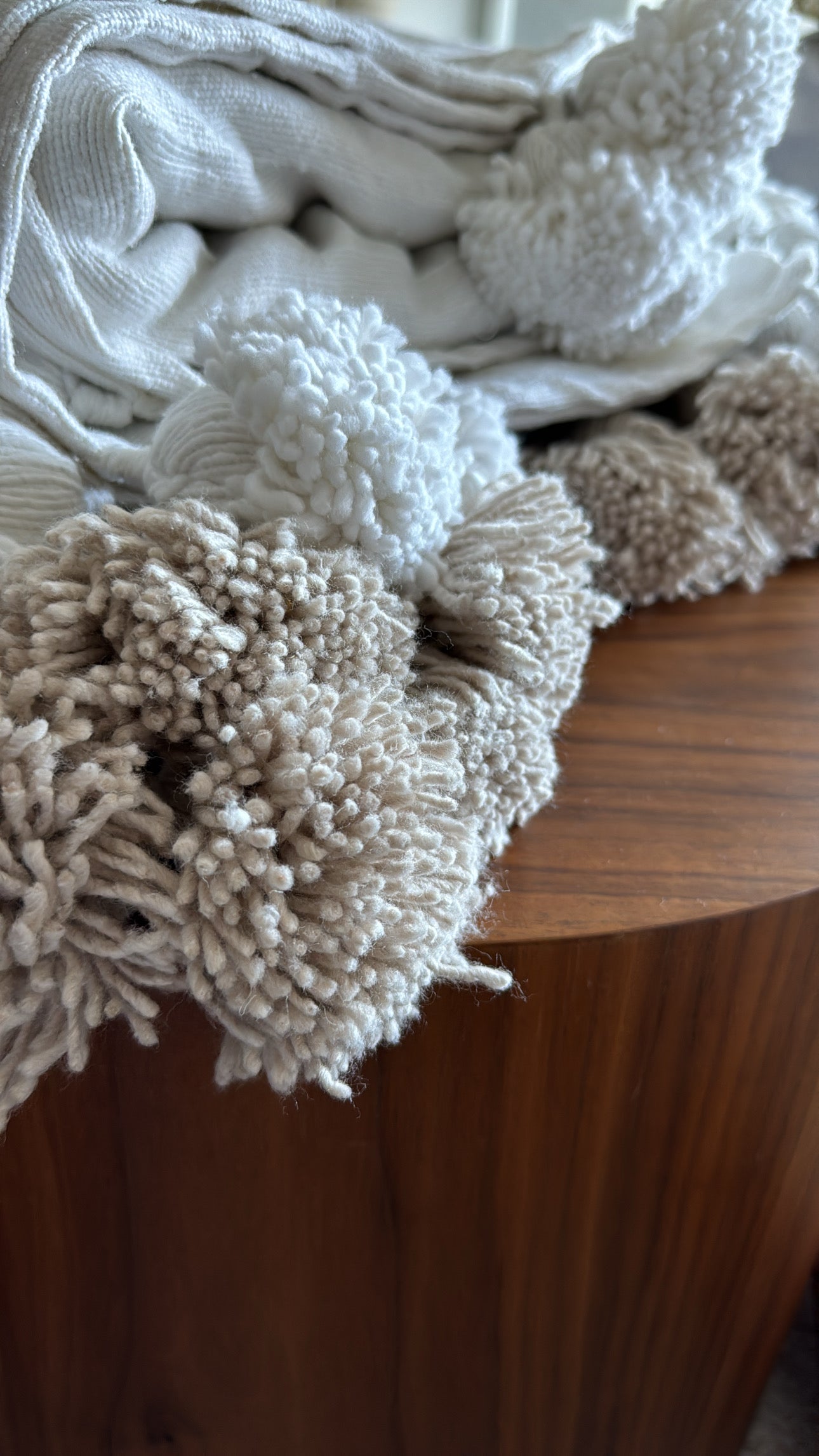 Plaid à pompons