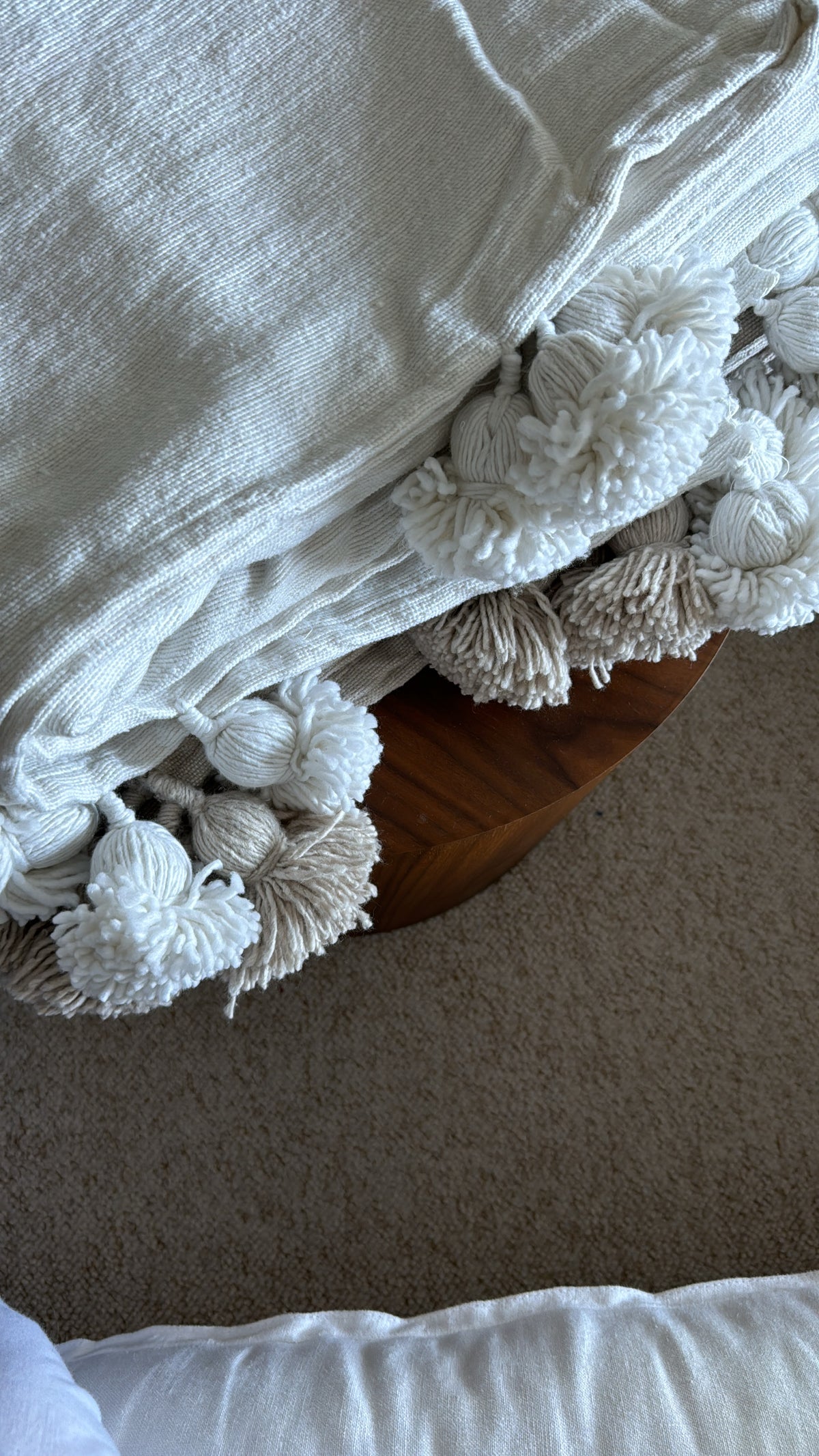 Plaid à pompons