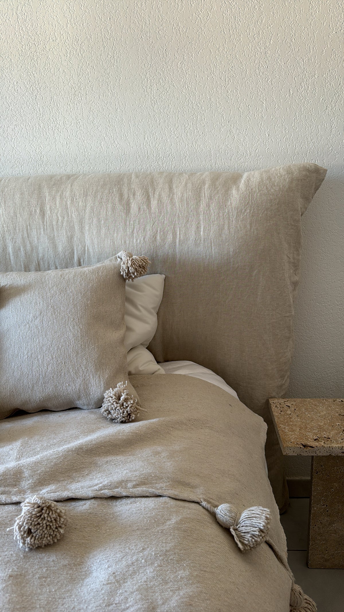 Coussin à pompons